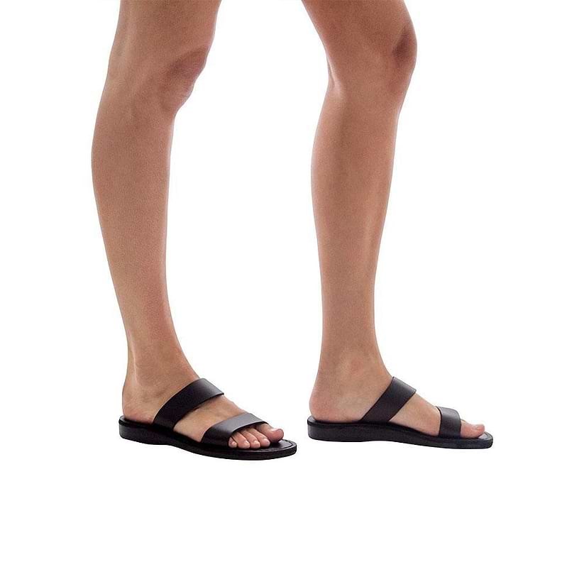 Model wearing Aviv black, handmade leather slide sandals 