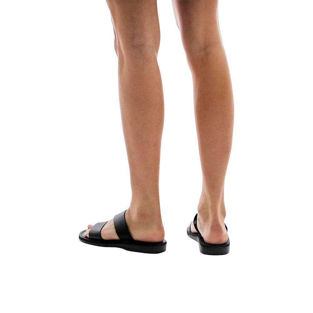 Model wearing Aviv black, handmade leather slide sandals 
