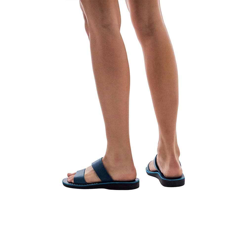 Model wearing Aviv blue, handmade leather slide sandals