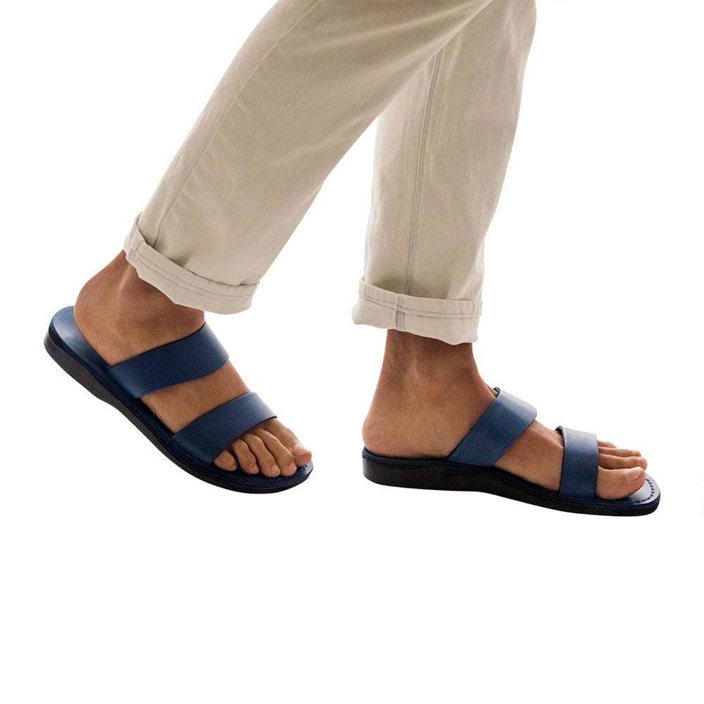 Model wearing Aviv blue, handmade leather slide sandals 