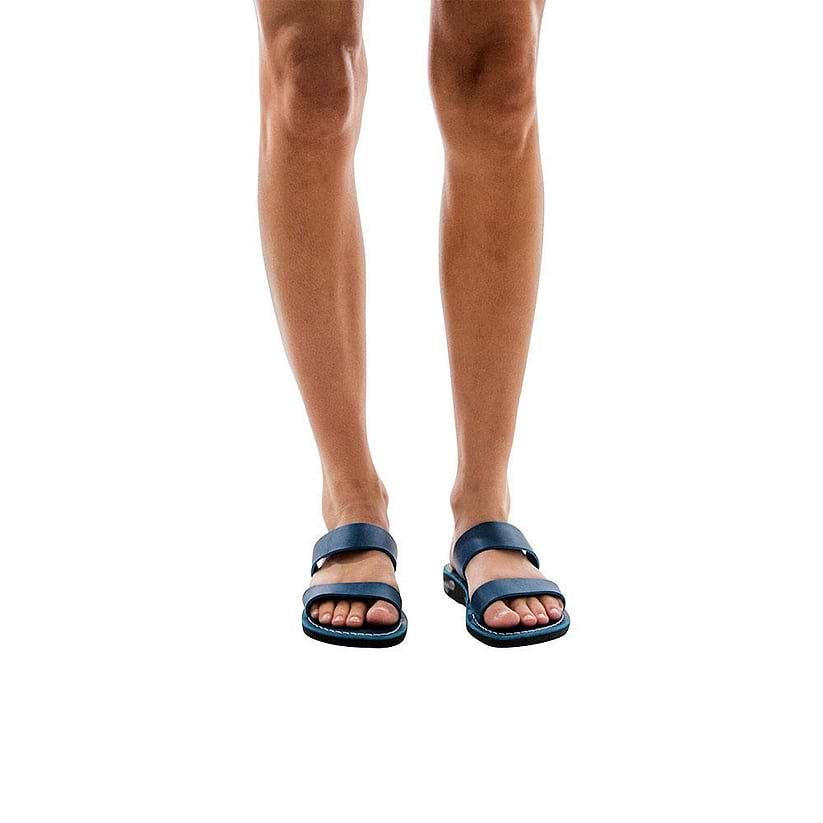 Model wearing Aviv blue, handmade leather slide sandals 