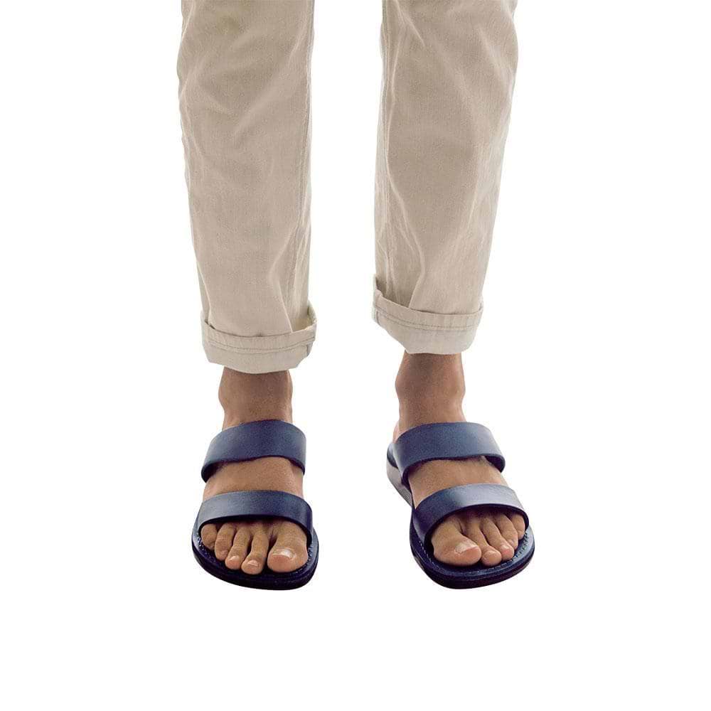 Model wearing Aviv blue, handmade leather slide sandals 