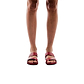 Model wearing Aviv red, handmade leather slide sandals 
