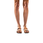 Model wearing Aviv tan, handmade leather slide sandals 