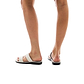 Model wearing Aviv white, handmade leather slide sandals 