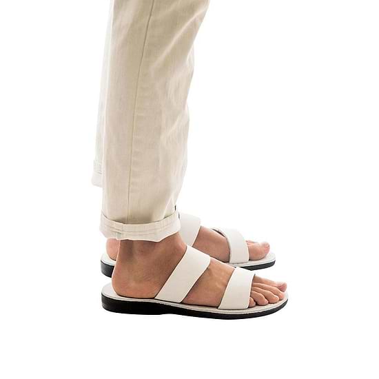 Model wearing Aviv white, handmade leather slide sandals 