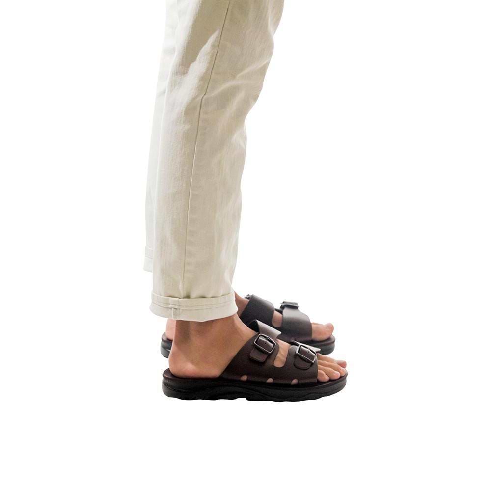 Model wearing Barnabas Brown, handmade leather slide sandals