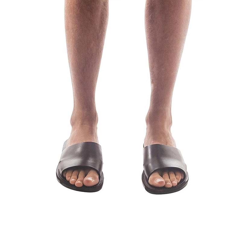 Model wearing Bashan brown, handmade leather slide sandals 
