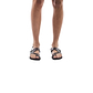 Model  wearing Benjamin black, handmade leather sandals with back strap and toe loop 