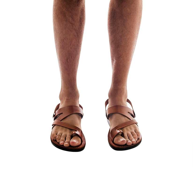 Model wearing Benjamin honey, handmade leather sandals with back strap and toe loop 