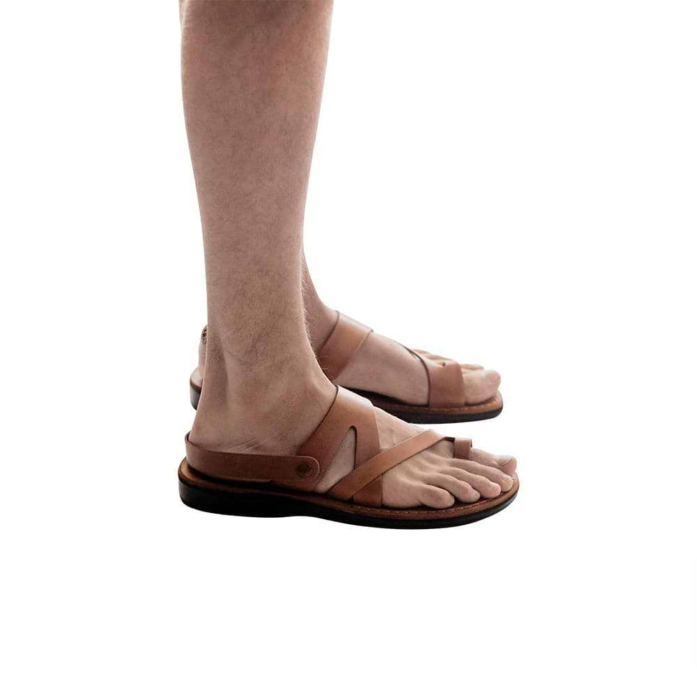 Model wearing Benjamin honey, handmade leather sandals with back strap and toe loop