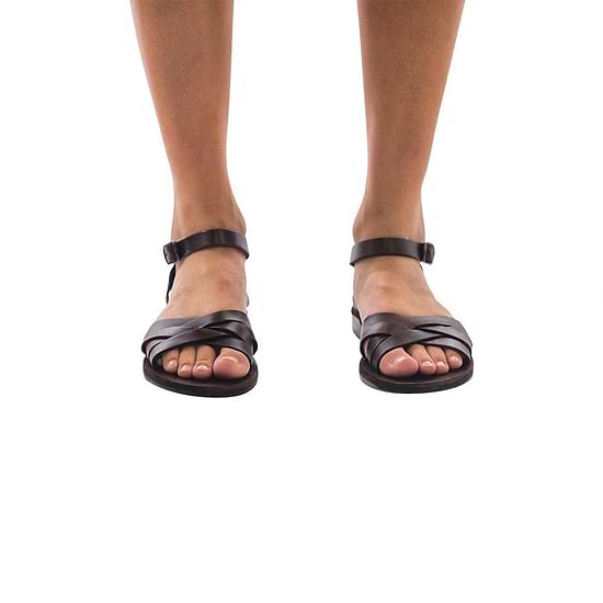 Model wearing Chloe black, handmade leather sandals with back strap