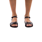 Model wearing Chloe black, handmade leather sandals with back strap