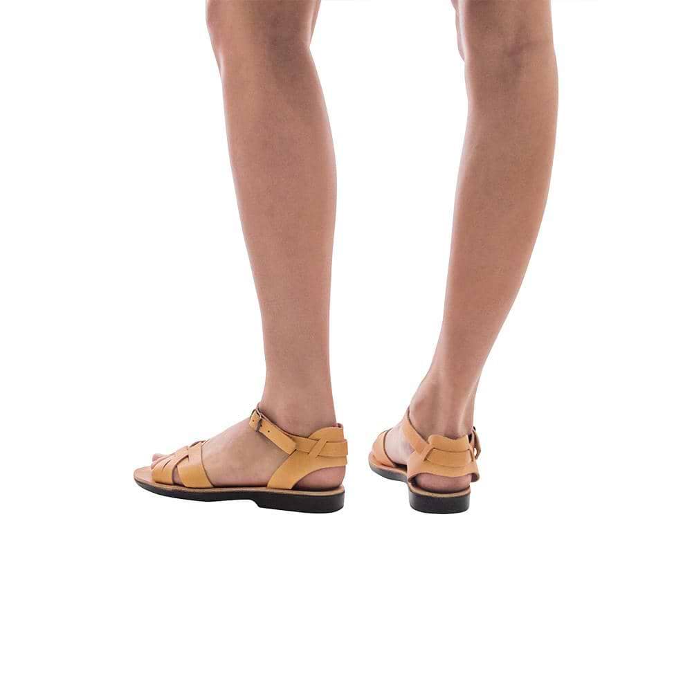 Model wearing Chloe tan, handmade leather sandals with back strap