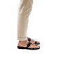 Model wearing David black, handmade leather slide sandals with toe loop
