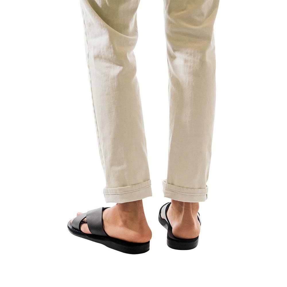 Model wearing Elan black, handmade leather slide sandals