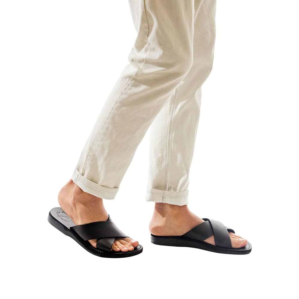 Model wearing Elan black, handmade leather slide sandals