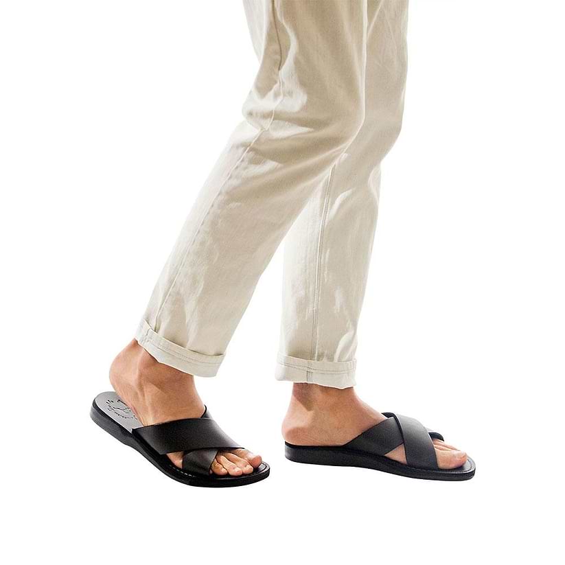Model wearing Elan black, handmade leather slide sandals