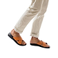 Model wearing Elan black-tan, handmade leather slide sandals