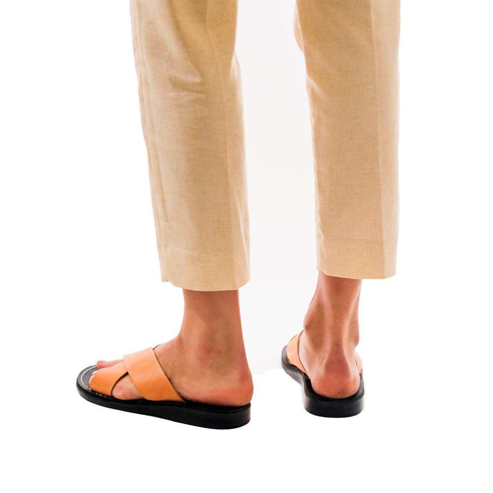 Model wearing Elan black tan, handmade leather slide sandals
