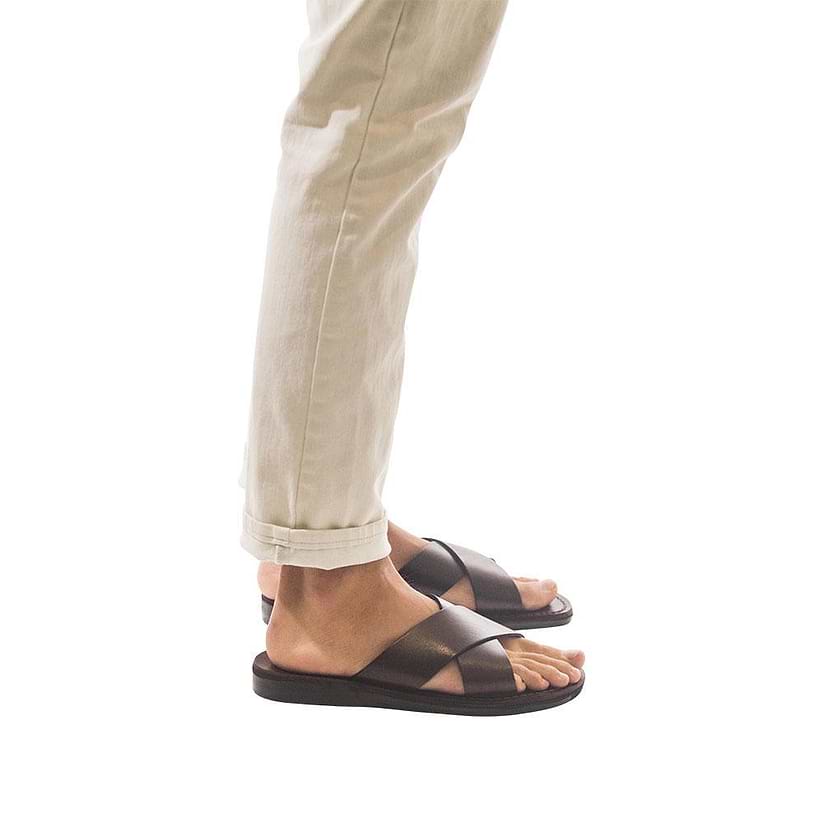 Model wearing Elan brown, handmade leather slide sandals