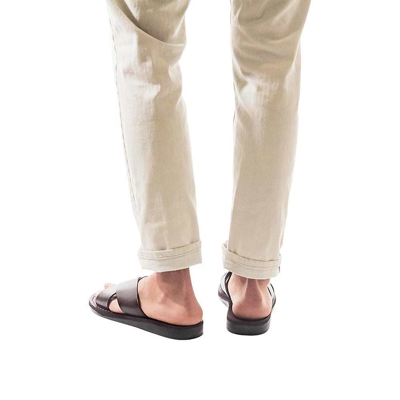 Model wearing Elan brown, handmade leather slide sandals