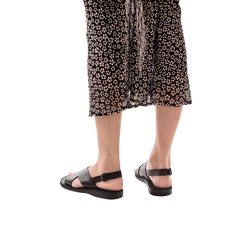 Model wearing Elan Buckle black, handmade leather sandals with back strap - Front View