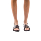 Model wearing Elan Buckle brown, handmade leather sandals with back strap - Front View