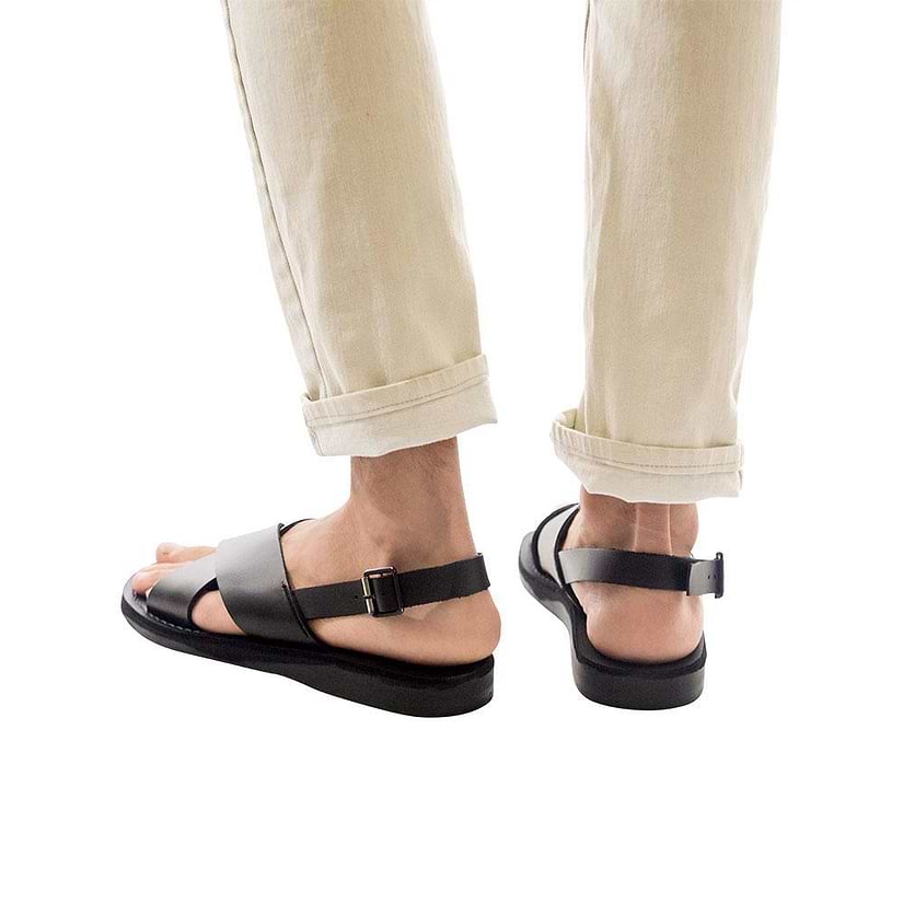 Model wearing Elan Buckle black, handmade leather sandals with back strap - Front View