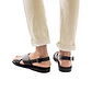 Model wearing Elan Buckle black, handmade leather sandals with back strap - Front View