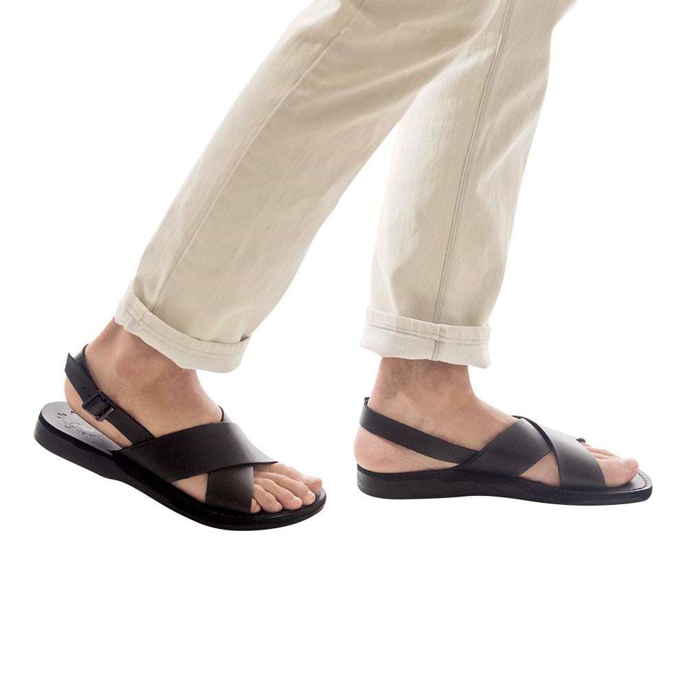 Model wearing Elan Buckle black, handmade leather sandals with back strap - Front View