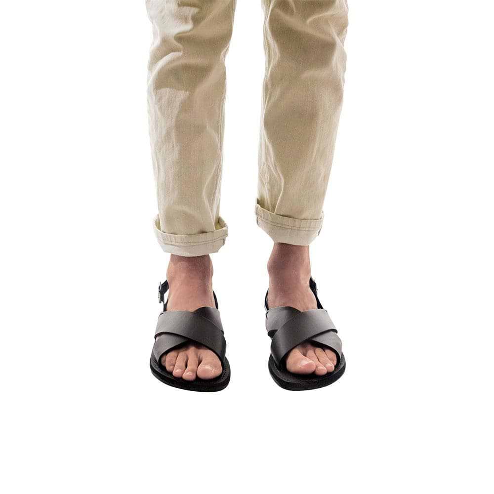 Model wearing Elan Buckle black, handmade leather sandals with back strap - Front View