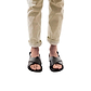 Model wearing Elan Buckle black, handmade leather sandals with back strap - Front View