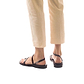 Model wearing Ella brown, handmade leather sandals with back strap and toe loop  
