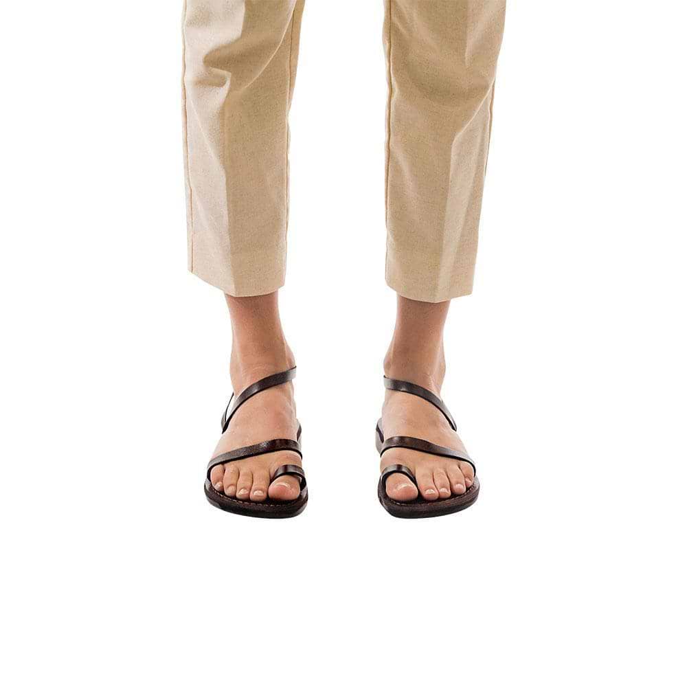 Model wearing Ella brown, handmade leather sandals with back strap and toe loop  