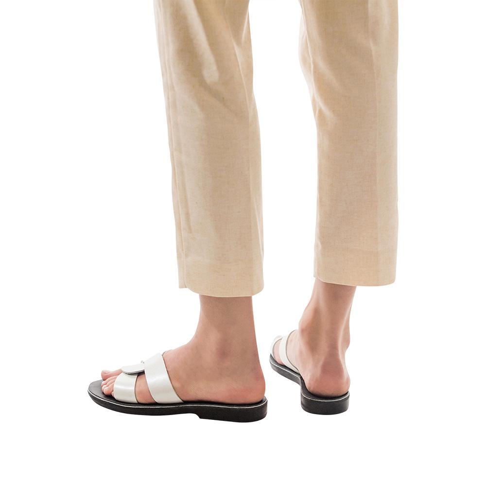 Model wearing Emily silver, handmade leather slide sandals