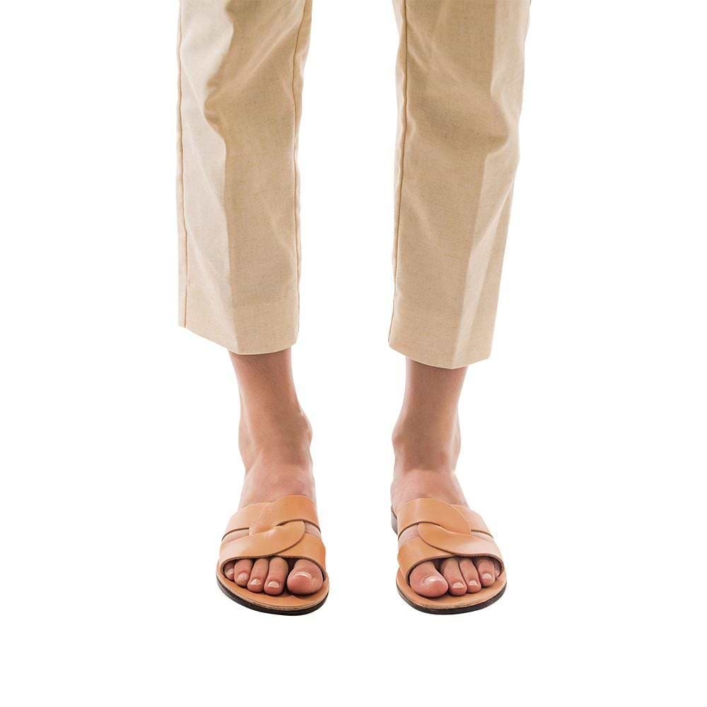 Model wearing Emily tan, handmade leather slide sandals