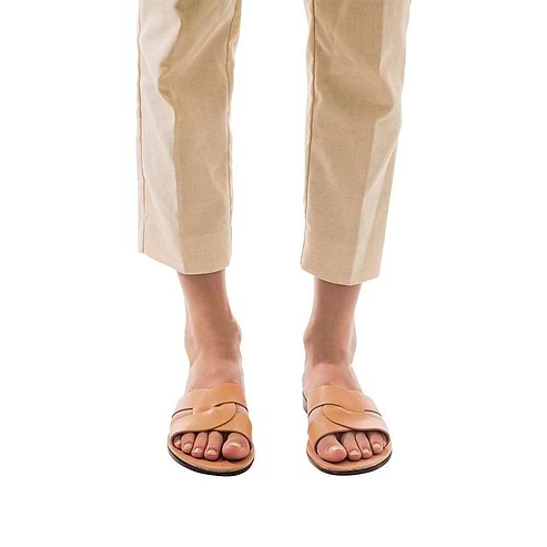 Model wearing Emily tan, handmade leather slide sandals