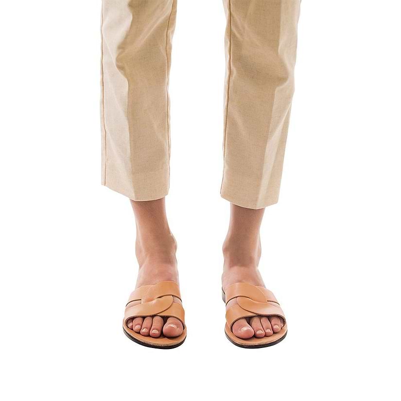 Model wearing Emily tan, handmade leather slide sandals