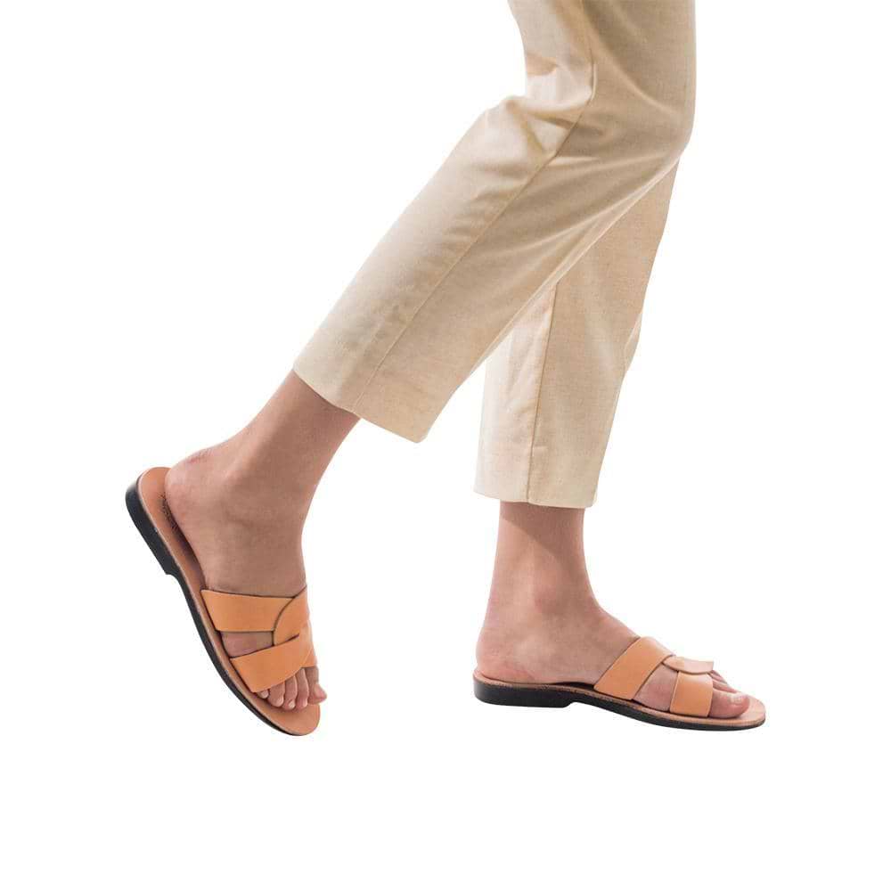 Model wearing Emily tan, handmade leather slide sandals