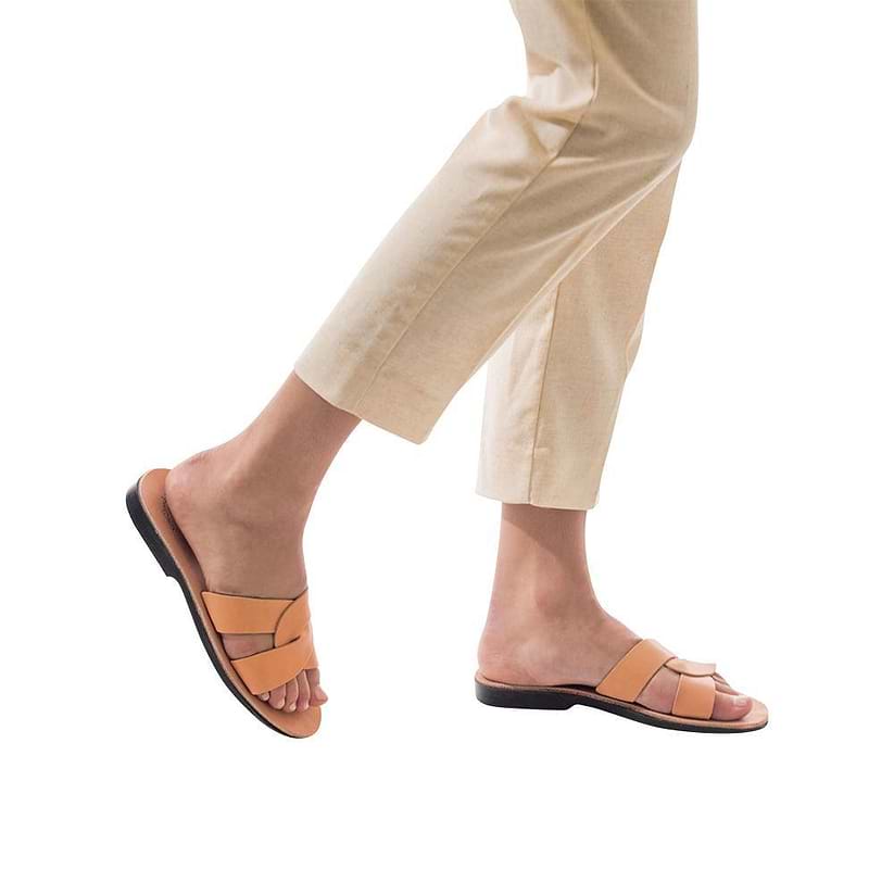 Model wearing Emily tan, handmade leather slide sandals
