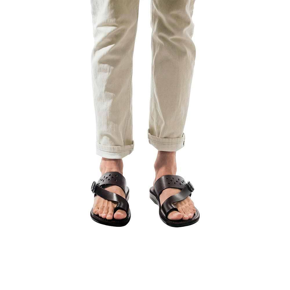 Model wearing Ezra Brown, handmade leather slide sandals with toe loop