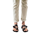 Model wearing Ezra Brown, handmade leather slide sandals with toe loop