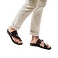 Model wearing Ezra Brown, handmade leather slide sandals with toe loop
