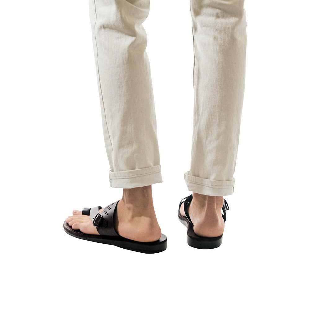 Model wearing Ezra Brown, handmade leather slide sandals with toe loop