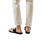 Model wearing Ezra Brown, handmade leather slide sandals with toe loop