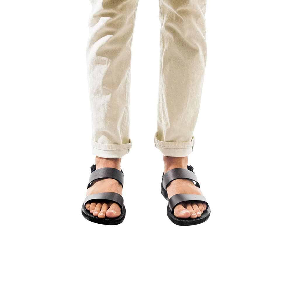 Model wearing Golan black, handmade leather sandals with back strap 