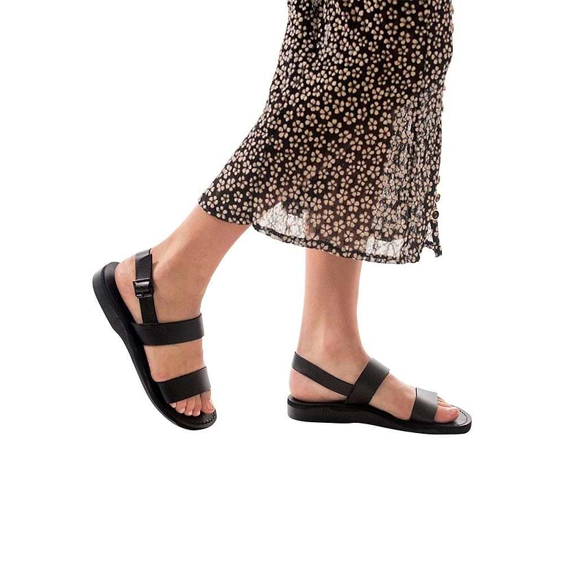 Model wearing Golan black, handmade leather sandals with back strap 
