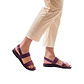 Model wearing Golan violet, handmade leather sandals with back strap 