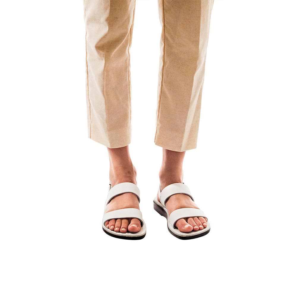 Model wearing Golan white, handmade leather sandals with back strap 